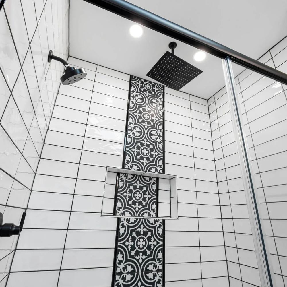 Stylish modern shower with a sleek black accent wall
