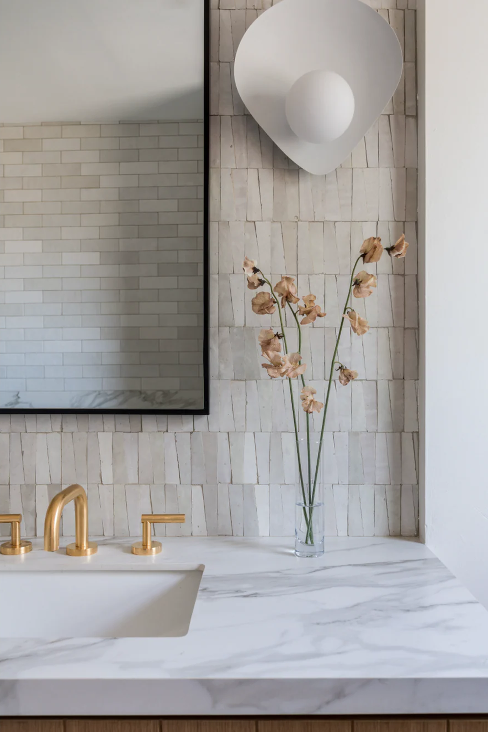 Stylish bathroom with zellige tiles and innovative design features