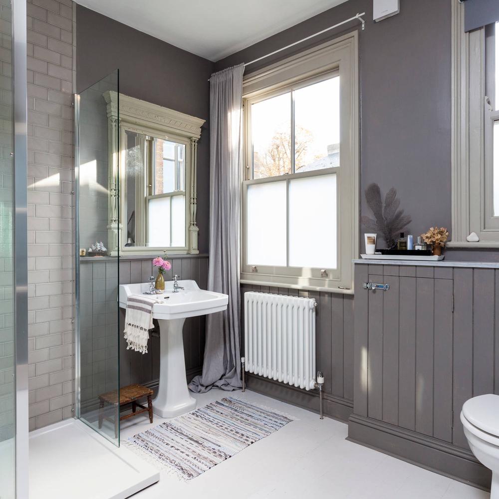 Vintage Flair Bathroom with Contemporary Functionalities.