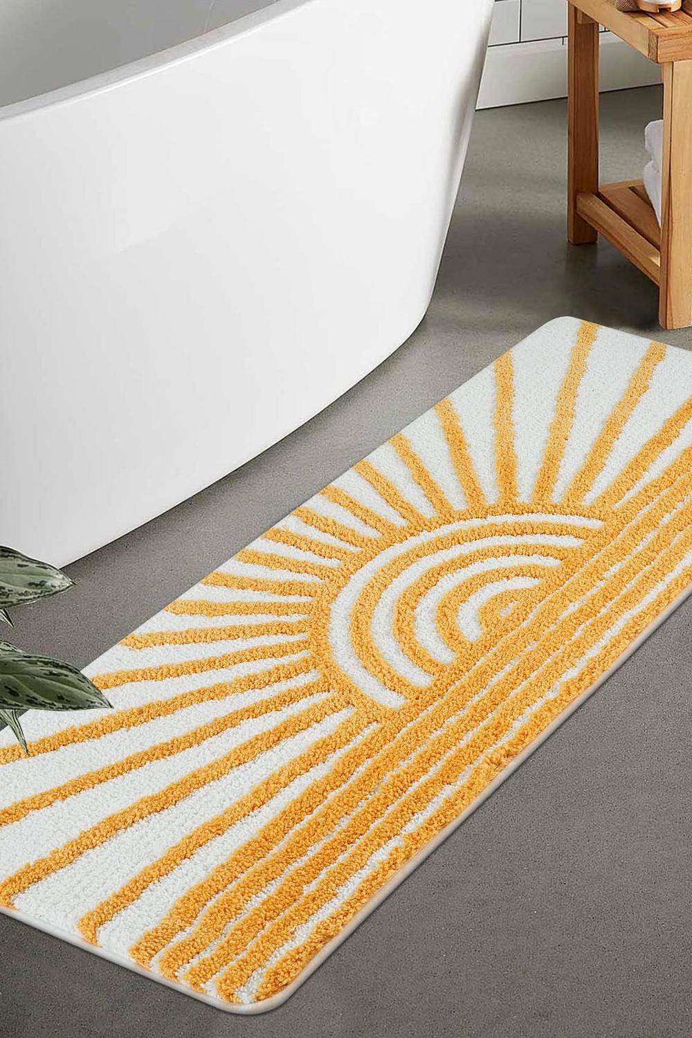 Baño boho divertido con mat en forma de sol